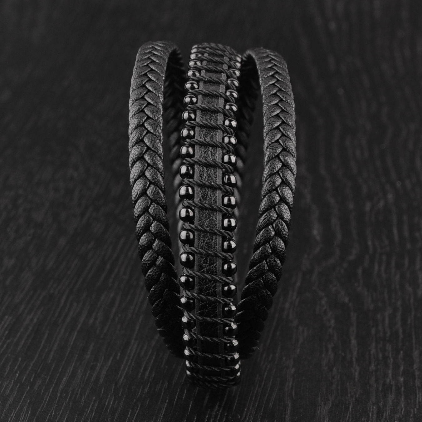 Multi-layer leather bracelet with black beads and black brushed 316 stainless steel clasp, front view